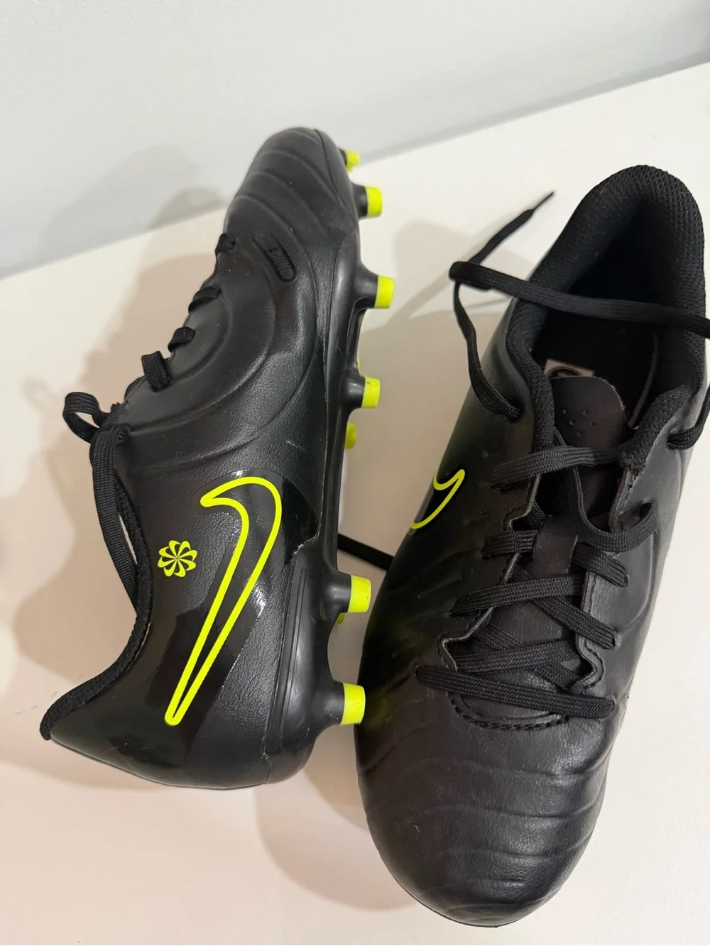 Nike Black Soccer Cleats with Neon Yellow Accents